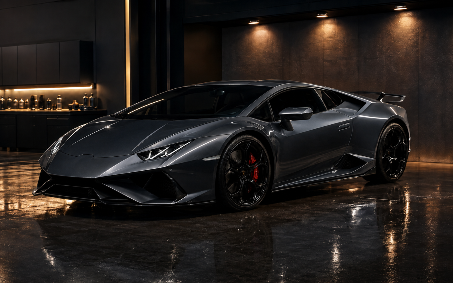 Metallic graphite exotic sports car in a premium detailing studio